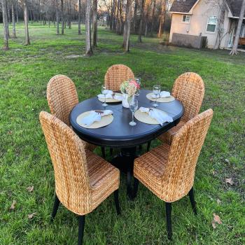 Black Table with Wicker Chairs