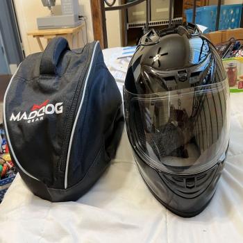 Motorcycle helmet with bag