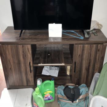 Brown entertainment stand 