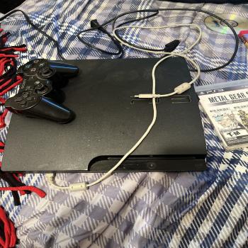 ps3 with controller and hames 