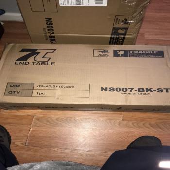 unopened living room end table